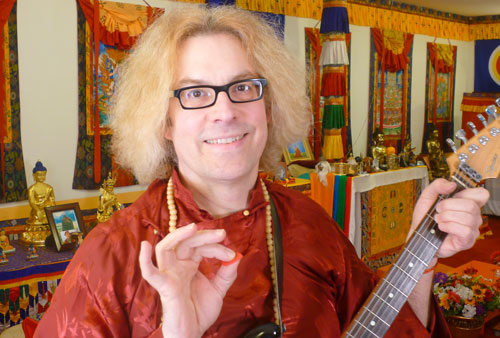 Hazlitt Krog with his electric guitar